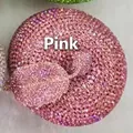 Detailed view of apple-shaped pink rhinestone clutch bag with crystal leaf design - Pink