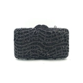 Detailed close-up of musical note patterns with black rhinestones on rectangular clutch - Music / Black