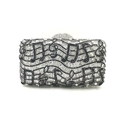 Detailed view of silver rhinestone clutch bag with black musical note crystal pattern - Music / Silver and Black