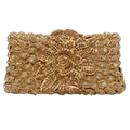 Macro shot of 3D crystal floral pattern and sparkling champagne rhinestones on golden clutch - Gold / Gold Rhinestone