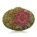 Macro detail of luxury egg-shaped clutch featuring hand-set crystal flower and jewel patterns - Gold-Green Multi-color