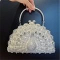 Silver peacock luxury clutch bag with blue and white rhinestones and a metal handle - Silver