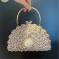Rose gold peacock evening clutch bag featuring a sparkling diamond studded metal ring handle - Light Gold
