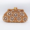 Close-up of luxury floral rhinestone clutch with amber crystals and metal frame clasp - Amber Vintage Lady Floral Style (14)