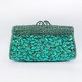 Close-up of emerald green crystal encrusted formal evening clutch bag with ornate clasp - Dark Green Marquise Gemstone Scroll Pattern Style (10)