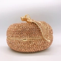 Sparkling rose gold apple shaped clutch bag fully encrusted with shimmering rhinestones - Champagne