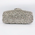 Detailed close-up of a silver clutch bag featuring hollowed-out sparkling rhinestones - Silver Wave Texture Full Rhinestone Style (16)