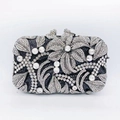 Detail view of silver crystal floral pattern on hollowed out evening clutch bag - Dark Base Silver Floral Full Rhinestone Style (22)
