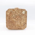 Detailed view of golden evening clutch with intricate crystal floral patterns and large diamond - Gold / Gold Rhinestone