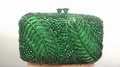Elegant emerald green stone clutch featuring shimmering crystals in a leaf-like pattern - Green