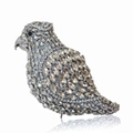 Close-up of luxury bird-shaped clutch bag with sparkling crystals and metal frame - Silver