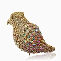Macro shot of parrot evening clutch bag with sparkling colorful AB rhinestones and gold base - Gold AB