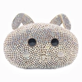 Macro detail of hand-set sparkling crystals on rabbit shaped luxury evening clutch bag - Small Rabbit Diamond Bag / Gold AB