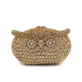 Close-up of golden owl clutch bag featuring intricate crystal rhinestones and floral gem eyes - All Gold