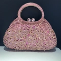 Pink rhinestone evening bag with floral crystal pattern and sparkling round metal handle - Pink