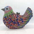 Detailed close-up of bird evening clutch bag featuring colorful pavé-set crystals and gems - Blue Green Head Black Multicolor