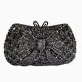 Elegant black evening clutch bag with sparkling rhinestones and a large bow design - Black