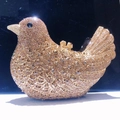 Detail of sparkling champagne gold bird-shaped clutch with dense rhinestones - Gold