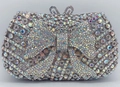 Rainbow rhinestone evening clutch bag with crystal bow decoration and metal chain strap - Silver AB