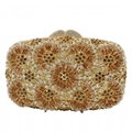 Close-up of luxury gold evening clutch with hollow metal and sparkling rhinestones - Gold Brown