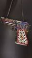 Macro shot of handgun shaped clutch evening bag with colorful rhinestone embellishments - New Black Multicolor Handgun Style