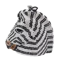 Macro shot of 3D zebra clutch bag featuring dense rhinestone embellishment details - Zebra