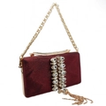 Dettaglio della pochette bordeaux con strass e nappe a catena dorata elegante - Borgogna