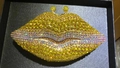 Macro shot of sparkling yellow rhinestone-studded lip evening bag with golden clasp - Yellow/AB Rhinestones
