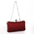 Macro detail of wine red evening clutch with rhinestone floral clasp and acrylic chain - Burgundy