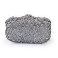 Detailed close-up of luxury silver evening clutch featuring 3D floral crystals and rhinestones - Silver