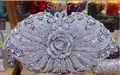 Elegant silver evening clutch bag with sparkling rhinestones and 3D metal rose design - Silver