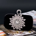 Close-up of black velvet evening bag with sparkling rhinestone flower and crystal ring clasp - Sunflower Rhinestone Black (A860)
