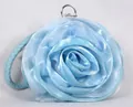 Macro detail of the light blue silk rose handbag showing 3D pleated fabric texture - Sky Blue