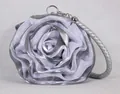 Detail of silver rose-shaped evening bag featuring layered 3D mesh fabric and metal rings - Silver