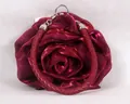 Detail of red rose evening bag featuring satin petals and woven top handle - Burgundy