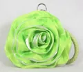 Detailed macro view of the lime green rose petal satin fabric and silver ring metal clasp - Fruit Green