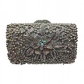Macro detail of a silver evening clutch featuring intricate diamond flower patterns - Silver AB Crystal