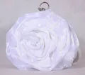 Detail of white silk rose floral clutch bag with a metallic ring handle and satin petals - White