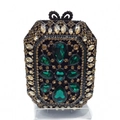 Detailed close-up of crystal evening bag with green drop gemstones and bow clasp - Vintage Green Gemstone Style / Black Green