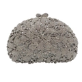 Detailed macro of silver evening clutch with rhinestones and flower petal pattern - Silver
