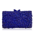 Macro detail of royal blue crystal evening clutch with floral rhinestone pattern and bow clasp - Blue