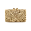 Detailed close-up of champagne gold crystal evening bag with elegant bow-shaped metal clasp - Light Gold