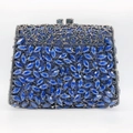 Macro detail of navy blue marquise stones and silver hollow metal floral evening clutch - Ink Blue