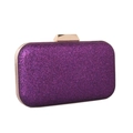 Macro view of purple glitter evening clutch bag with gold metallic clasp and trim - Purple