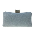 Close-up of silver sequined evening clutch bag with sparkling rhinestone encrusted gold clasp - Silver