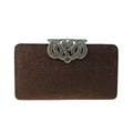 Close-up of bronze glitter evening clutch with ornate silver rhinestone wavy clasp detail - Coffee