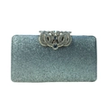 Detailed view of silver sequin evening bag featuring a crystal-embellished top handle clasp - Silver