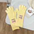 Detailed knit texture of bright yellow winter gloves with Doria Fashion logo patch - One Size / Yellow