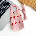 Detail of knitted heart pattern mini phone bag with pink handle and metallic snap button - Heart Sentiment (5 Metal Buckle)