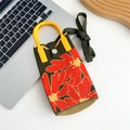 Detail of green knitted phone bag featuring red floral pattern and yellow ring handle - Orange Green Large Flower (7 Metal Buckle)